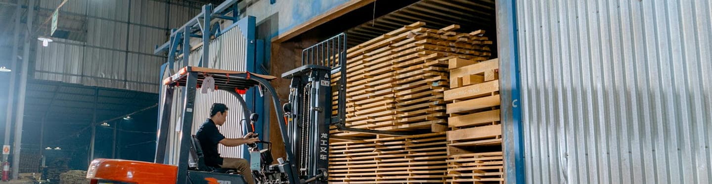 Organised warehouse with inventory aisles